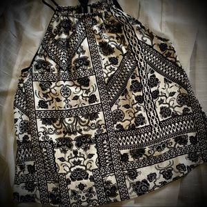 Black and white printed sleeveless blouse